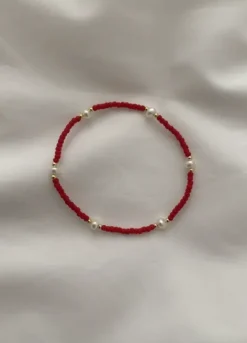 Aria rannekoru, kulta