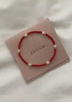 Aria rannekoru, kulta