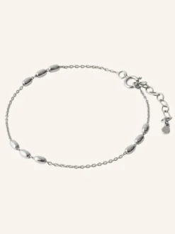 Caia rannekoru, hopea