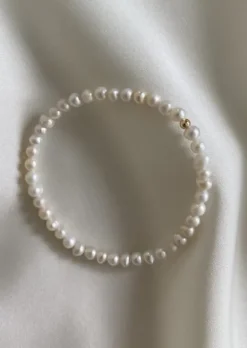 Elle rannekoru, kulta