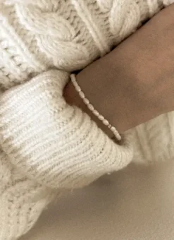 Evia rannekoru, hopea