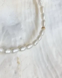 Evia rannekoru, kulta