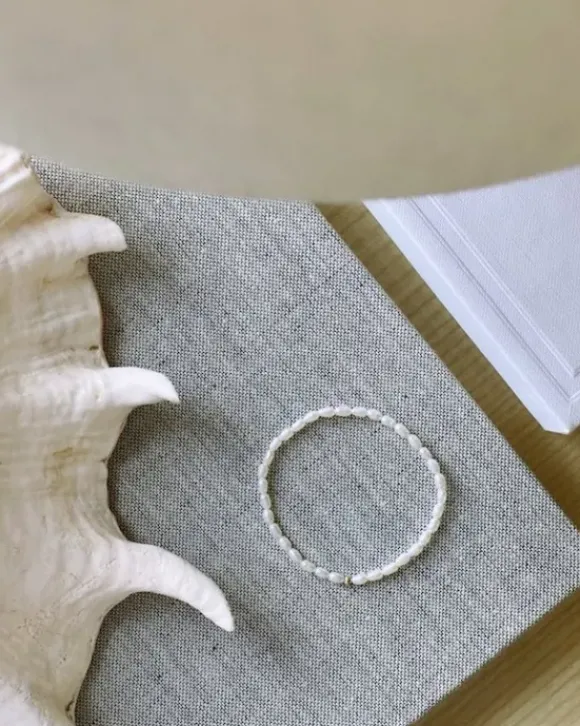 Evia rannekoru, kulta